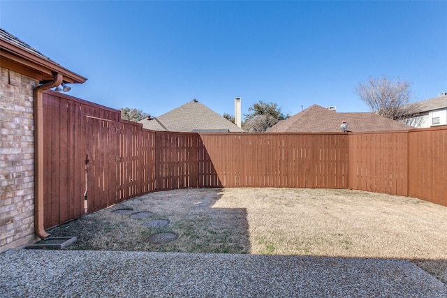 view of yard featuring a fenced backyard