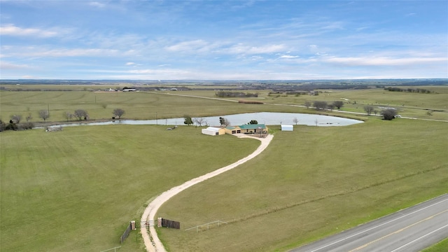 aerial view with a water view and a rural view