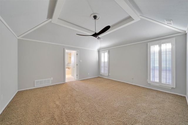 unfurnished room featuring ornamental molding, carpet, and visible vents