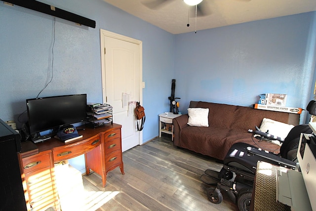 office area featuring ceiling fan and wood finished floors