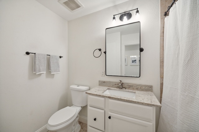 bathroom featuring visible vents, a shower with shower curtain, toilet, vanity, and baseboards