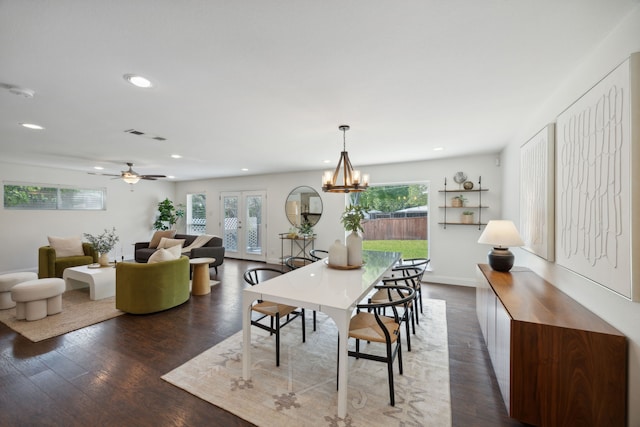 dining room with recessed lighting, plenty of natural light, wood finished floors, and french doors