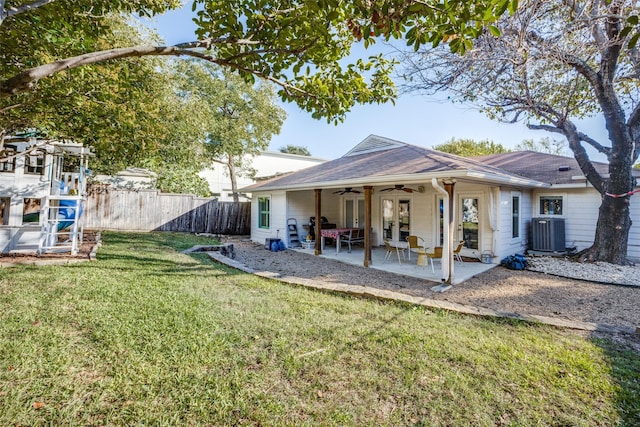 back of house with a patio, a lawn, central AC unit, a ceiling fan, and fence