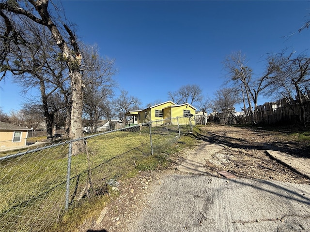 view of front of home with fence