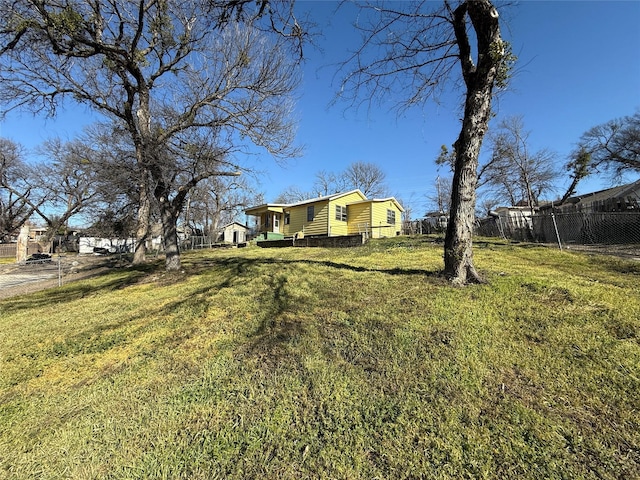 view of yard featuring fence