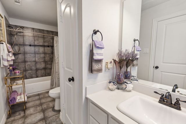 full bath featuring tile patterned flooring, toilet, visible vents, vanity, and shower / bath combo with shower curtain