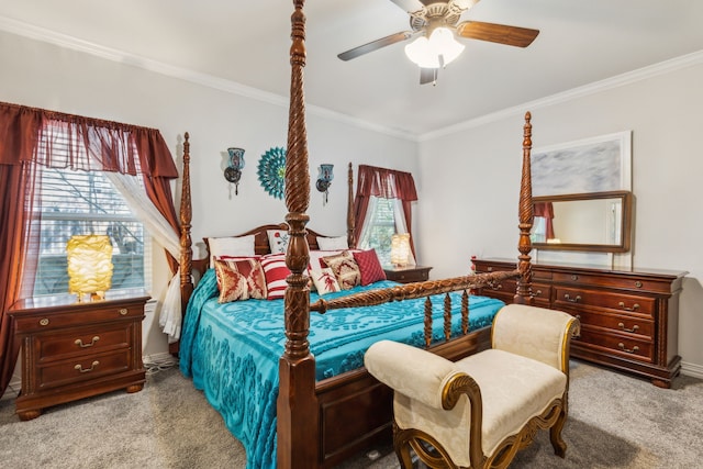 bedroom with carpet floors, multiple windows, ornamental molding, and a ceiling fan