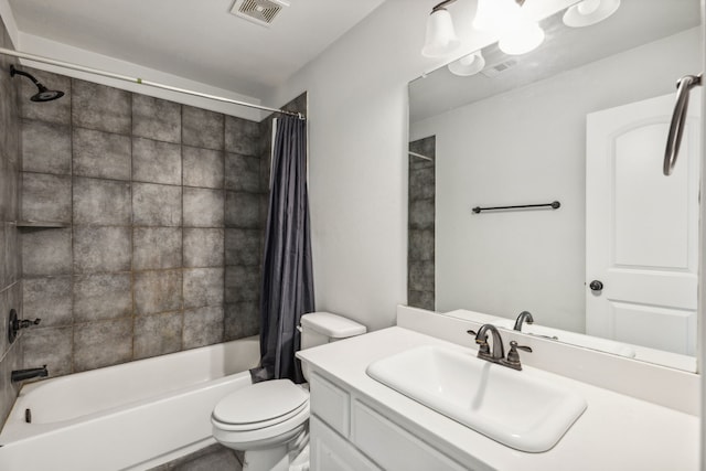 full bathroom with toilet, vanity, shower / bath combo with shower curtain, and visible vents