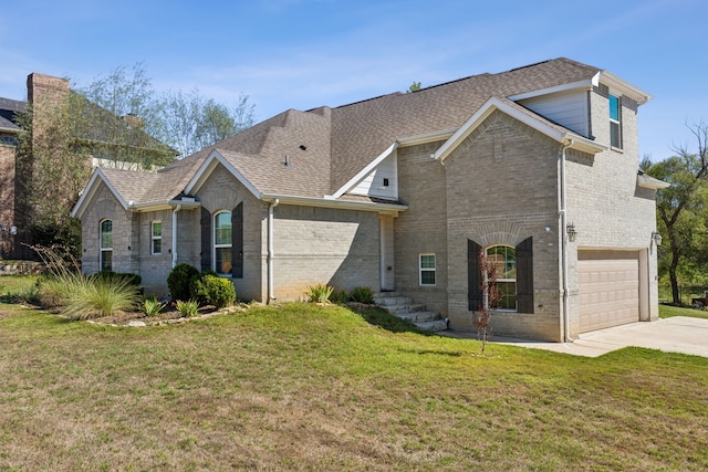 view of front facade with a garage, concrete driveway, roof with shingles, a front lawn, and brick siding