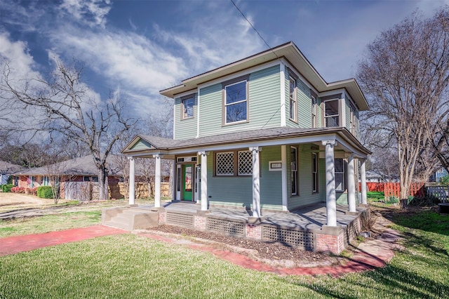 view of front facade featuring a porch and a front lawn