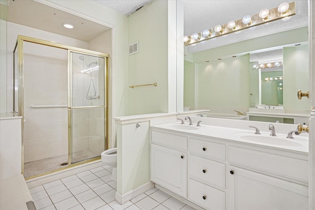 full bathroom with a shower stall, visible vents, a sink, and a textured ceiling