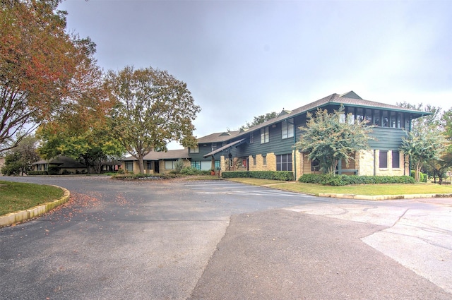 view of front of house featuring uncovered parking