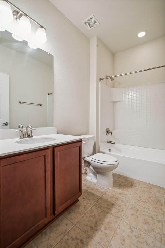 full bath featuring bathtub / shower combination, visible vents, toilet, vanity, and tile patterned floors