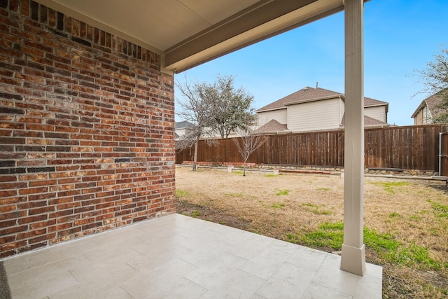 view of patio with a fenced backyard