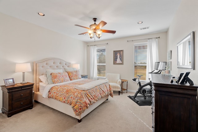 bedroom with light carpet, visible vents, baseboards, ceiling fan, and recessed lighting