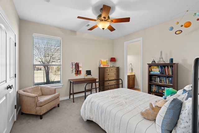 bedroom with baseboards, ceiling fan, visible vents, and light colored carpet