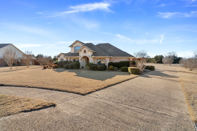 view of front of home featuring stone siding