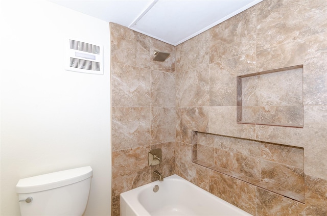 bathroom featuring toilet, visible vents, and bathing tub / shower combination