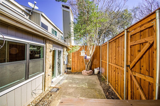 view of patio featuring a fenced backyard