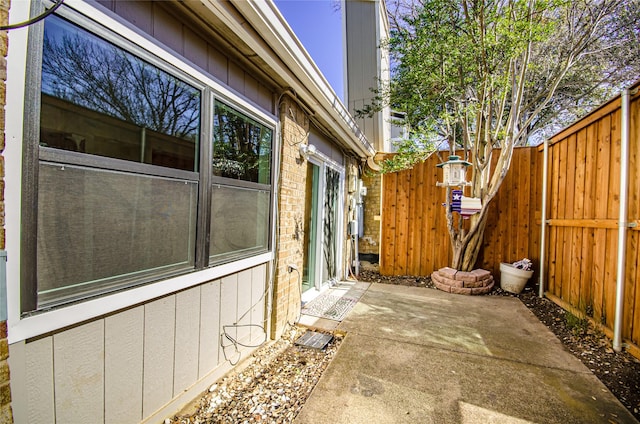 view of patio with fence