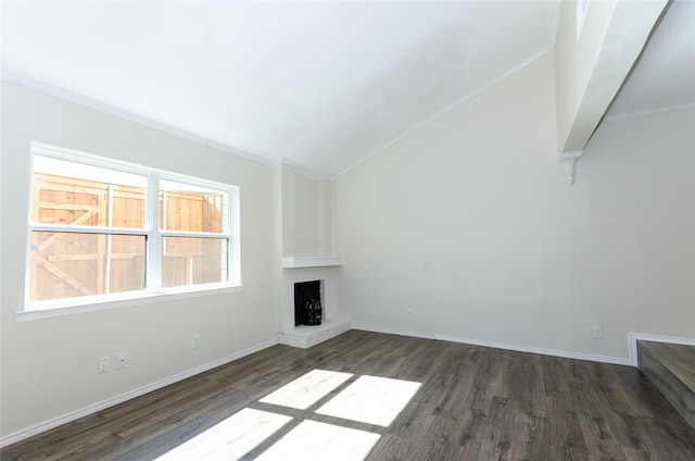 unfurnished living room featuring a large fireplace, baseboards, vaulted ceiling, and dark wood-style flooring