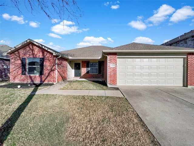 ranch-style home featuring a garage, brick siding, driveway, and a front lawn