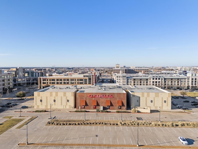 birds eye view of property with a view of city