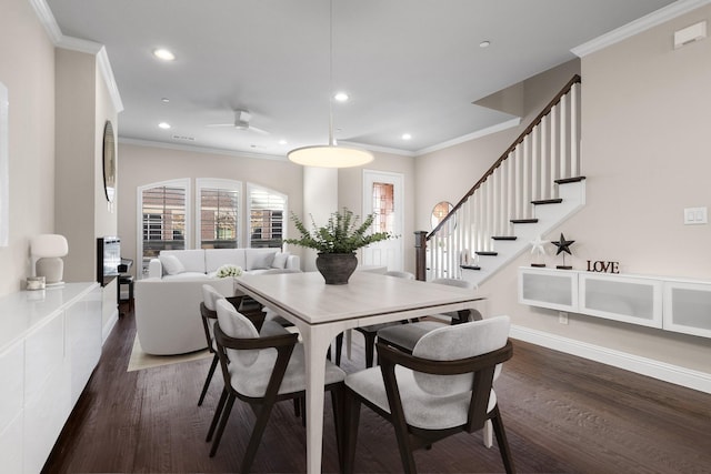 dining room featuring dark wood-style flooring, recessed lighting, and crown molding