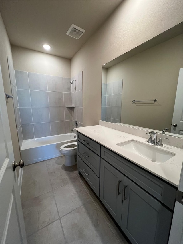 full bath with shower / bathtub combination, toilet, vanity, and visible vents