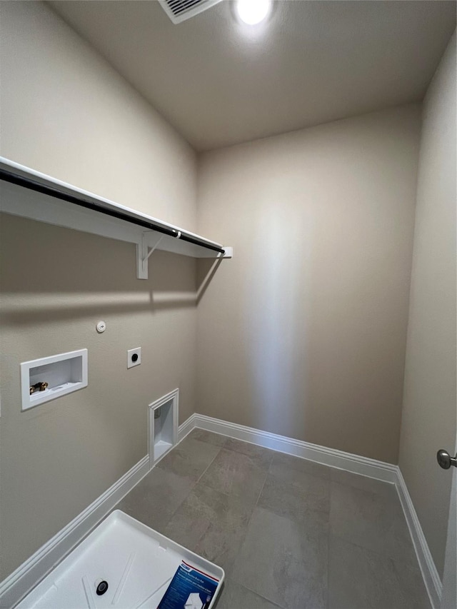 laundry room featuring gas dryer hookup, hookup for a washing machine, laundry area, baseboards, and electric dryer hookup