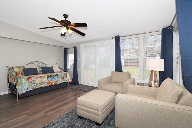 bedroom with a ceiling fan, baseboards, and wood finished floors