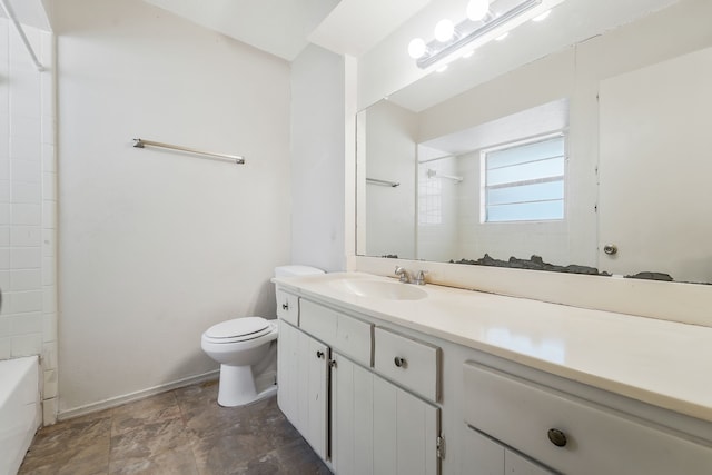 bathroom with baseboards, vanity, toilet, and shower / bathtub combination