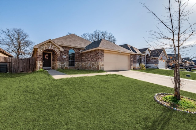 view of front of home with stone siding, a front yard, fence, and brick siding