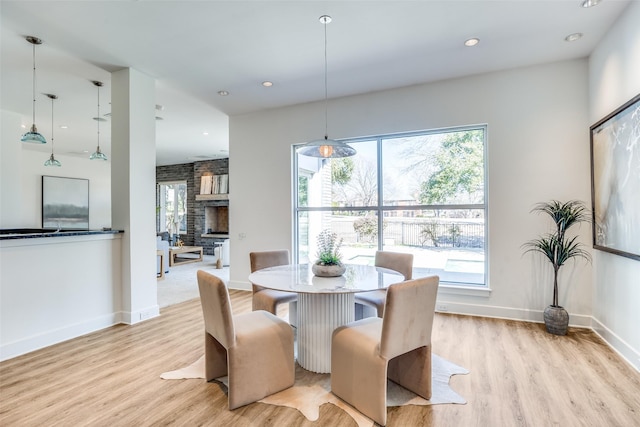 6007 Club Oaks Dr, Dallas, TX 75248 - dining space featuring light wood-type flooring, healthy amount of natural light, recessed lighting, and baseboards