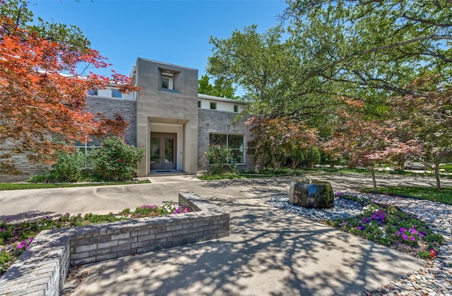 6007 Club Oaks Dr, Dallas, TX 75248 - view of front of house featuring french doors and brick siding