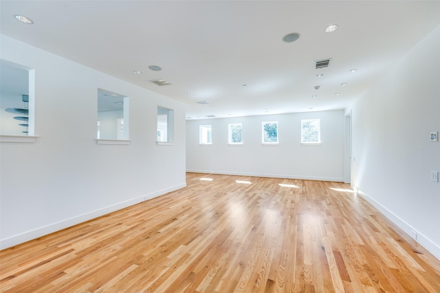 6007 Club Oaks Dr, Dallas, TX 75248 - unfurnished room with light wood-type flooring and baseboards