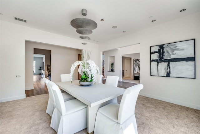 6007 Club Oaks Dr, Dallas, TX 75248 - dining space featuring light colored carpet and baseboards