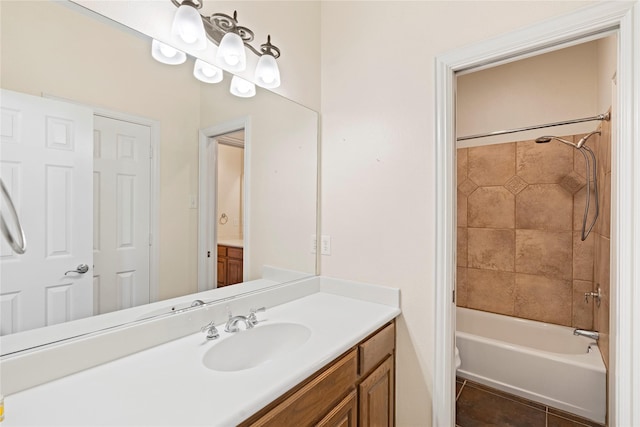 bathroom with tile patterned floors, shower / bathing tub combination, and vanity