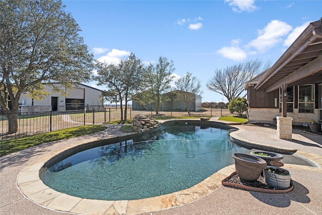 view of swimming pool with a fenced backyard and a fenced in pool