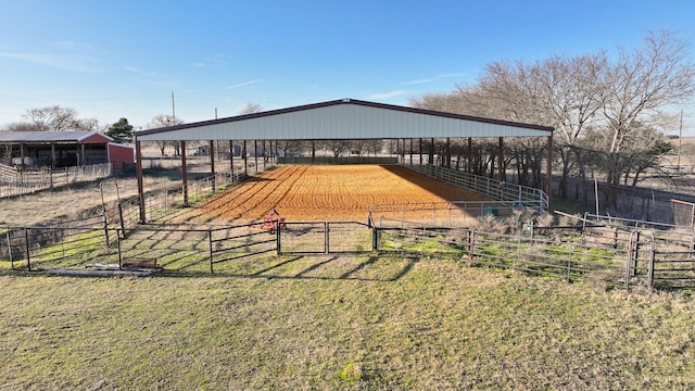 view of stable featuring a rural view