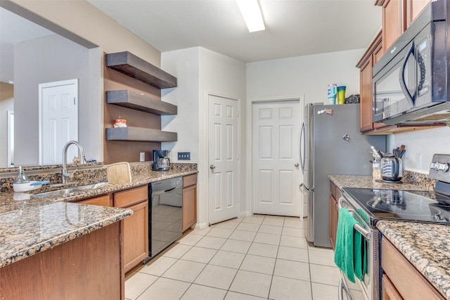 kitchen featuring light tile patterned floors, brown cabinetry, black appliances, open shelves, and a sink