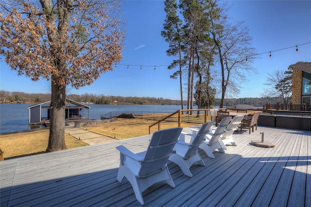 wooden terrace with a water view