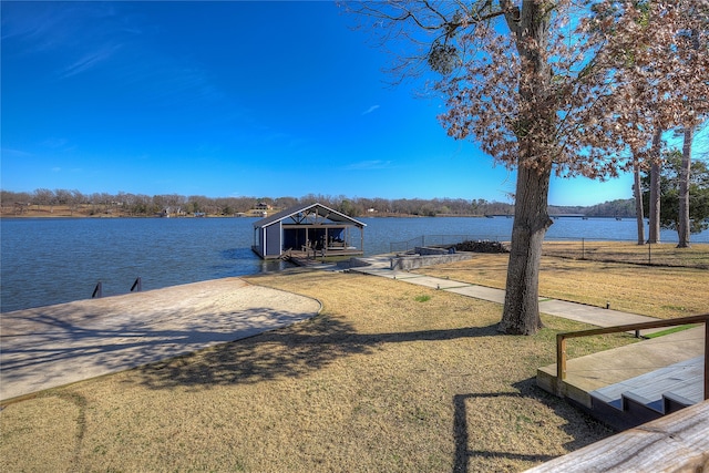 dock area with a water view