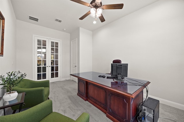 office area featuring visible vents, light colored carpet, and french doors