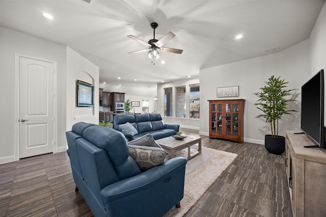 living room featuring ceiling fan, recessed lighting, visible vents, and baseboards