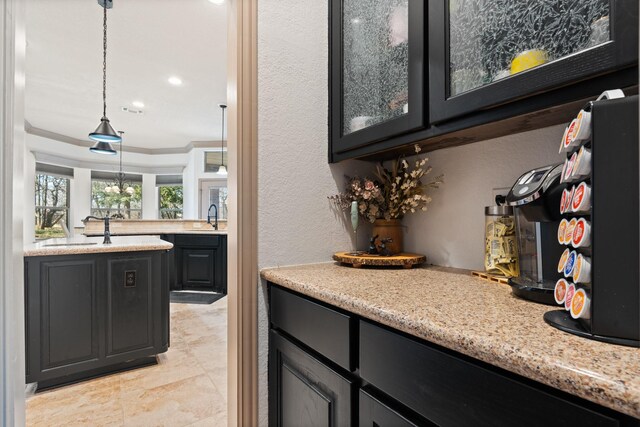 5809 Downing Ln, Joshua, TX 76031 - bar area with a sink, crown molding, decorative light fixtures, a textured wall, and recessed lighting