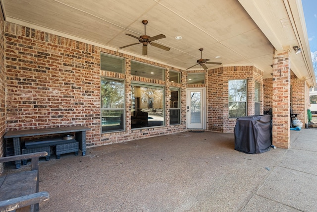 view of patio / terrace with ceiling fan and grilling area