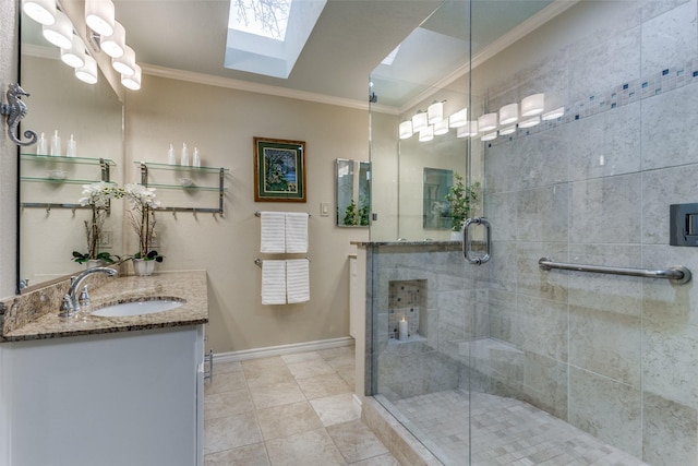 full bath featuring vanity, baseboards, ornamental molding, a shower stall, and tile patterned floors