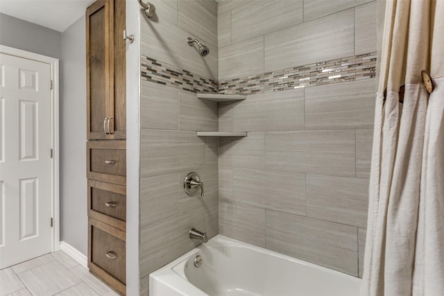 bathroom with shower / bath combination with curtain