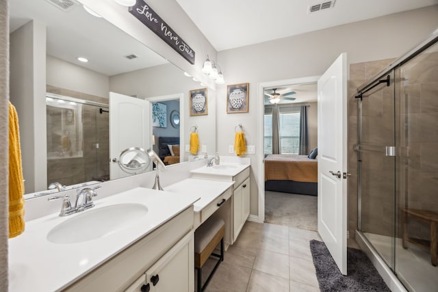 full bath with visible vents, connected bathroom, and a sink